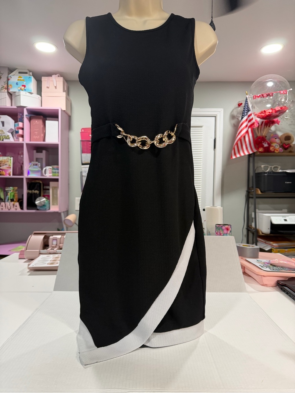 Love Black Sleeveless Mini Dress with White Trim and Gold Chain